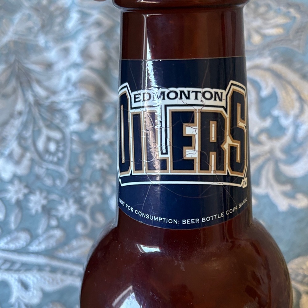NHL Edmonton Oilers Brown Bottle with Gold Cap Coin Bank - Picture 5 of 7